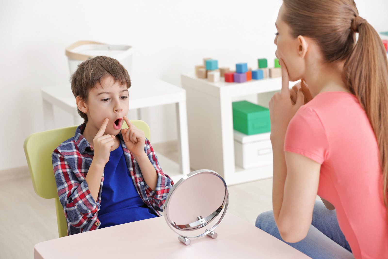 Cute little boy at speech therapist office Cute little boy at speech therapist office